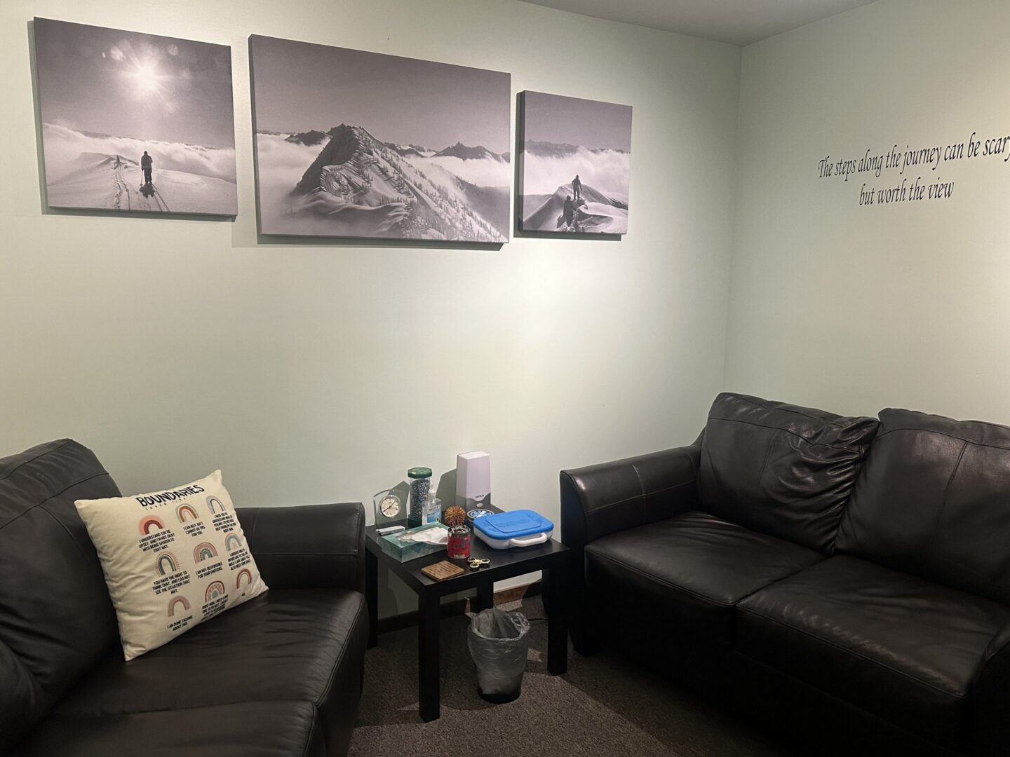 Seating area with mountain photography on wall
