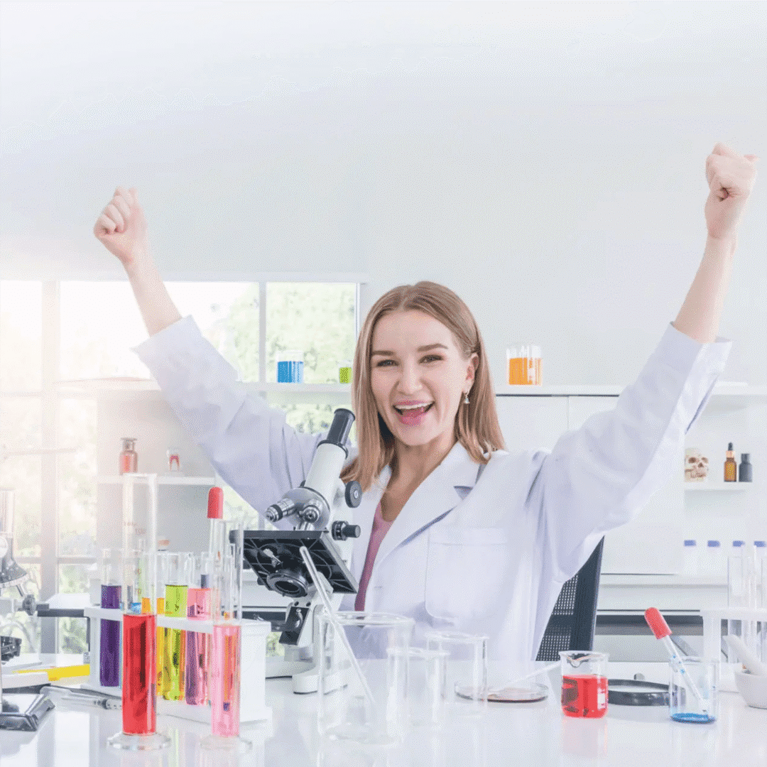 Scientist celebrating in laboratory